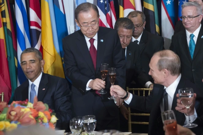 Le président américain Barack Obama, le secrétaire général de l'Onu Ban Ki-moon et le président russe Vladimir Poutine lors d'un déjeuner à l'Onu le 28 septembre 2015 à New York