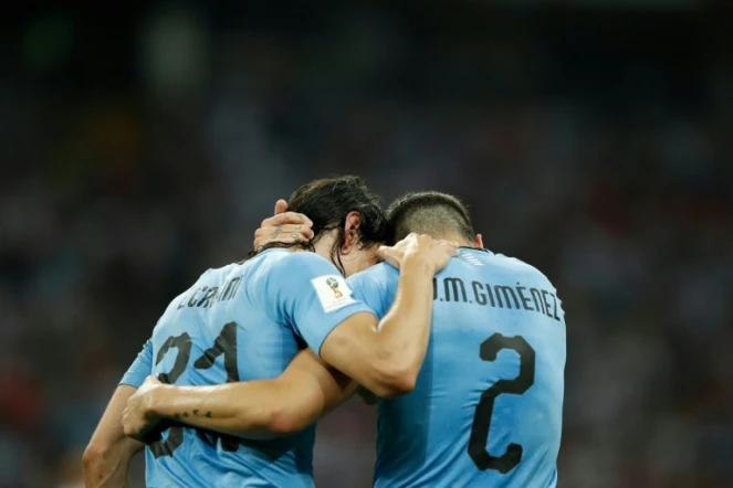 Les Uruguayens Edinson Cavani et Jose Gimenez, le 30 juin 2018, à Sotchi, face au Portugal