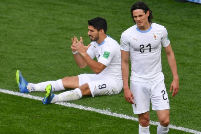 Les attaquants uruguayens Luis Suarez (g) et Edinson Cavani face à l'Egypte au Mondial, le 15 juin 2018 à Ekaterinbourg  