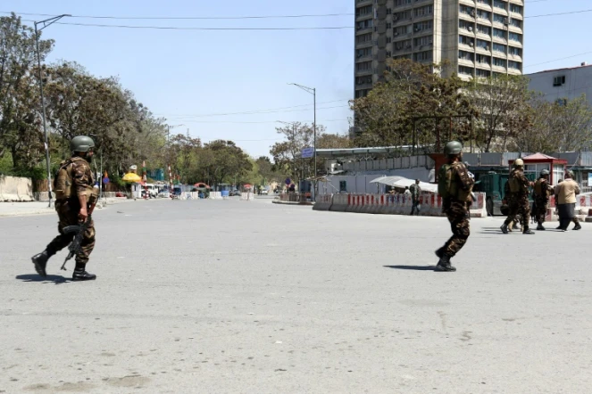 Des membres de forces de sécurité afghanes lors d'une attaque dans le centre de Kaboul, le 20 avril 2019 en Afghanistan