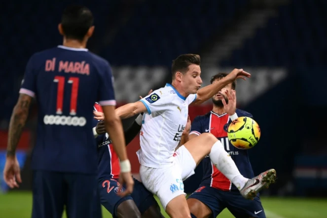 L'attaquant de Marseille, Florian Thauvin (c), buteur lors du match de Ligue 1 face au Paris-SG, au  Parc de Princes, le 13 septembre 2020