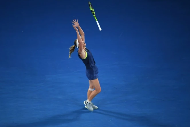 La Danoise Caroline Wozniacki ivre de joie après son succès sur la Roumaine Simona Halep en finale de l'Open d'Australie, à Melbourne, le 27 janvier 2018