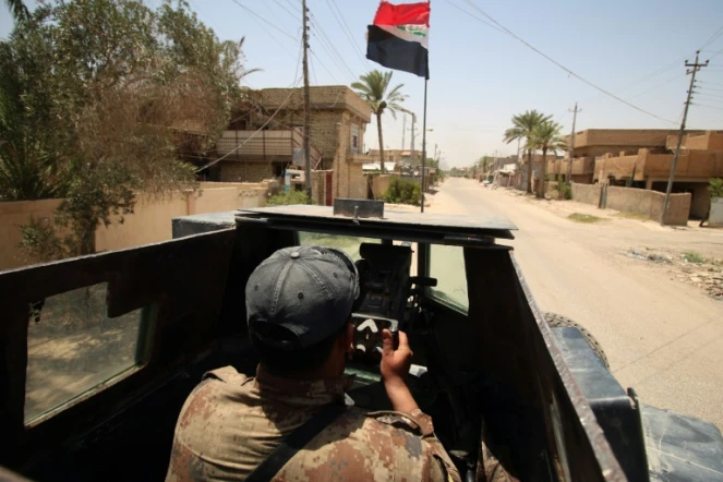 Le drapeau irakien sur un véhicule des forces du contre-terrorisme, le 23 juin 2016 à Fallouja 