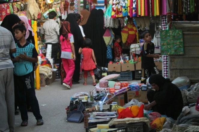 Photographie d'archives datant du 16 juillet 2012 d'un marché dans le grand quartier chiite Sadr City, dans le nord de Bagdad