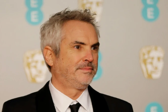 Le Mexicain Alfonso Cuaron qui a reçu le Bafta du meilleur réalisateur avec son film "Roma" le 10 février 2019 à Londres

,Mexican director Alfonso Cuaron poses on the red carpet upon arrival at the BAFTA British Academy Film Awards at the Royal Albert Hall in London on February 10, 2019.