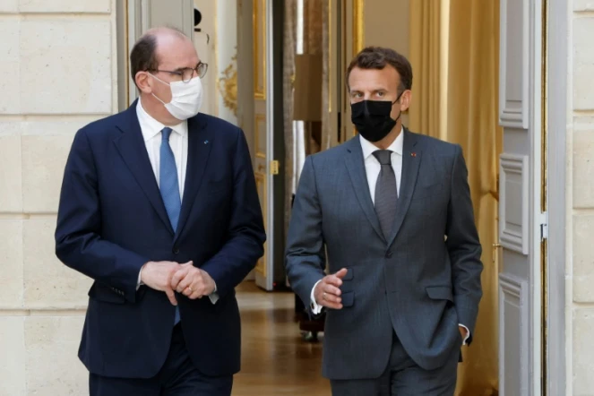 Le président Emmanuel Macron (d) et le Prmeier ministre Jean Castex, le 9 juin 2021 à l'Elysée