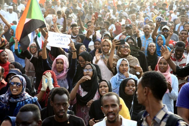 Des Soudanais manifestent en hommage aux personnes tuées tuées lors de la dispersion d'un sit-in, le 13 juillet 2019 à Khartoum