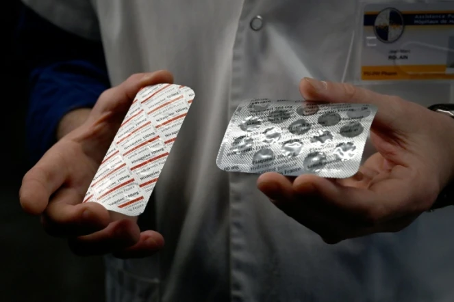 Deux plaquettes de médicaments: une de Nivaquine, qui contient de la chloroquine, et une de Plaqueril, qui contient de l'hydroxychloroquine, le 26 février 2020 à Marseille