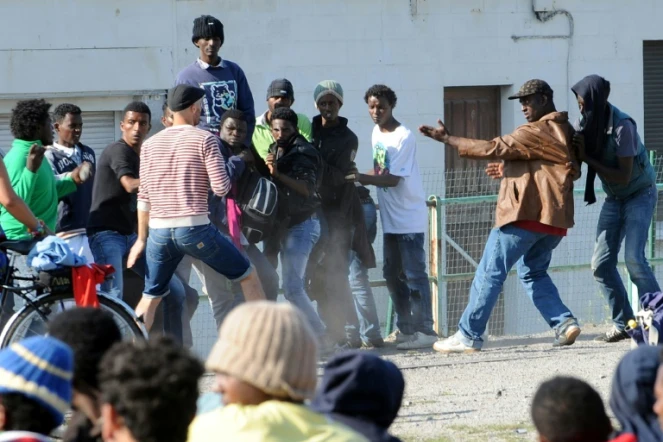 Des migrants à Calais, le 5 août 2014 
