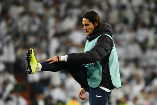 L'attaquant uruguayen du PSG Edinson Cavani s'échauffe lors du match de Ligue des champions contre le Real, le 26 novembre 2019 à Madrid 