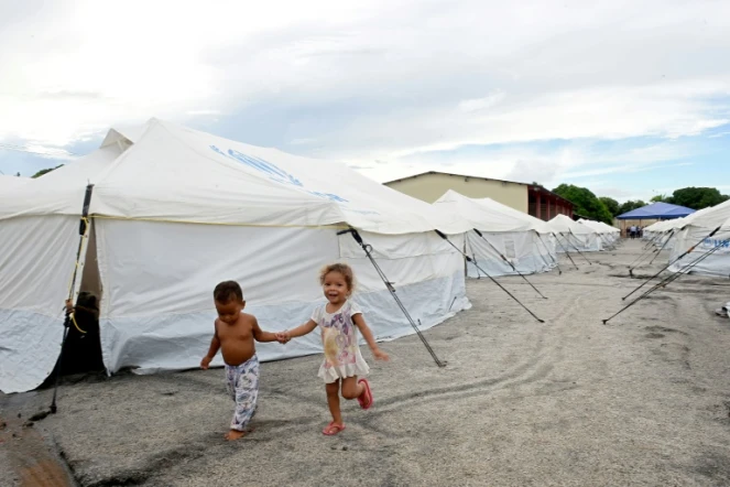 Deux enfants vénézueliens dans un camp de réfugiés dans l'Etat de Roraima, au nord du Brésil. Le 3 mai 2018.