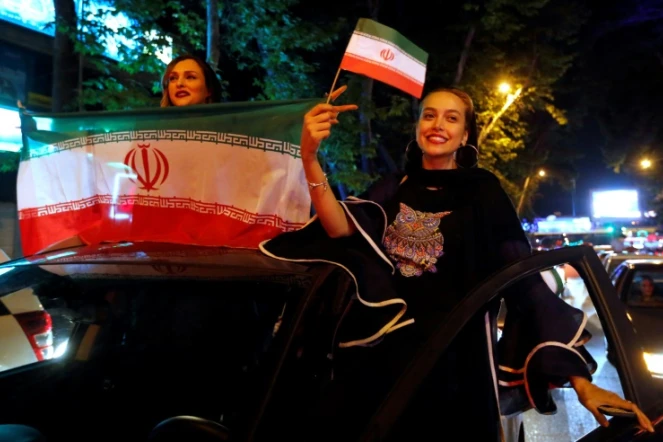 Des supportrices iraniennes fêtent la victoire de leur sélection face au Maroc lors du Mondial, le 15 juin 2018 à Téhéran