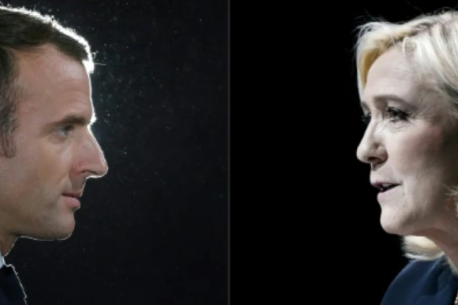 Le candidat-président Emmanuel Macron et la candidate du Rassemblement National Marine Le Pen dans un collage créé le 14 avril 2022