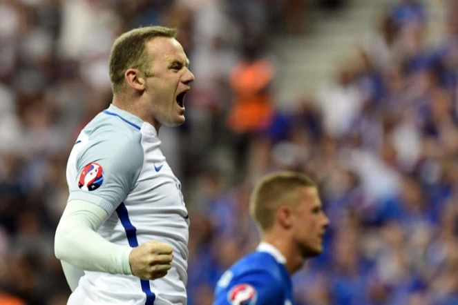 L'attaquant de l'équipe d'Angleterre Wayne Rooney exulte après avoir inscrit un but face à l'Islande, lors de l'Euro-2016, le 27 juin à Nice