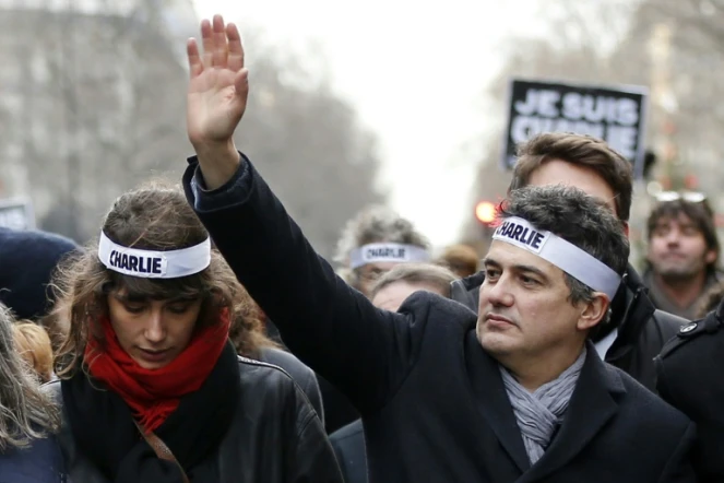 L'urgentiste Patrick Pelloux (D) lors de la manifestation unitaire du 11 janvier 2015 à Paris en hommage aux victimes de la tuerie de Charlie Hebdo