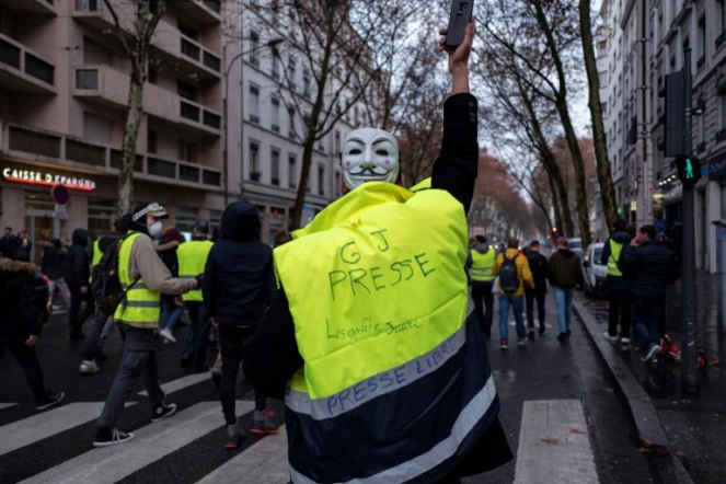 Des Gilets jaunes lors d'une manifestation à Lyon le 22 décembre 2018