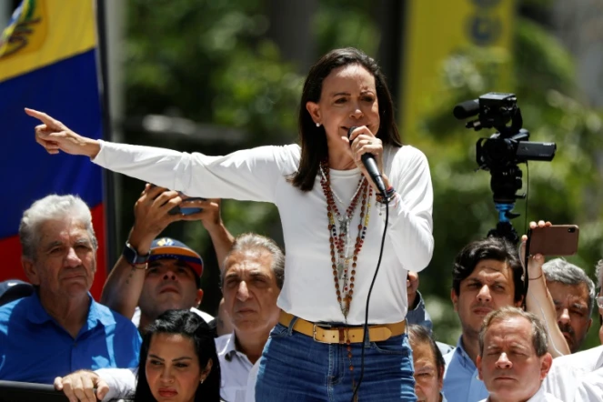 Maria Corina Machado (c), leader de l'opposition vénézuélienne, lors d'un rassemblement à Caracas, le 28 août 2024