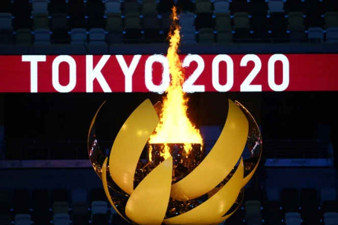 La flamme olympique lors de la cérémonue d'ouverture des Jeux olympiques de Tokyo le 23 juillet 2021 