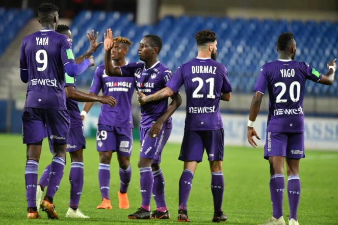 Les Toulousains se congratulent après un but de Max-Alain Gradel contre l'AC Ajaccio, le 23 mai 2018 à Montpellier