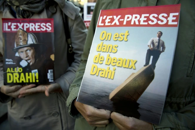 Les salariés de L'Express, L'Expansion et L'Etudiant manifestent contre un plan social révélé par Patrick Drahi, le 2 octobre 2015 à Paris
