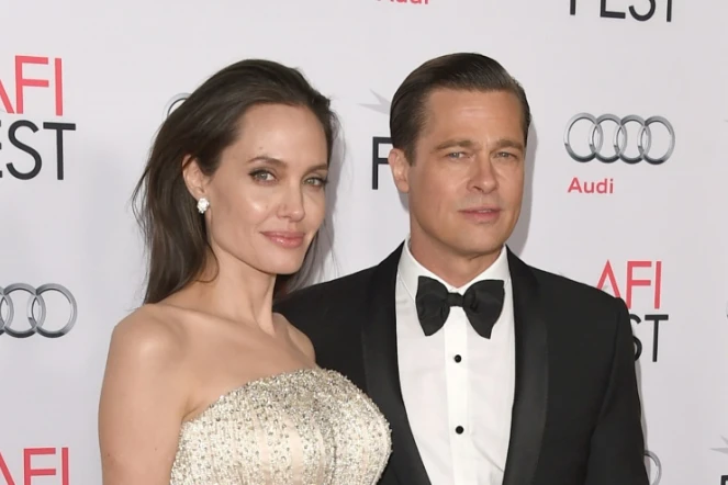 Les acteurs américains Angelina Jolie Pitt (g) et Brad Pitt, le 5 novembre 2015 à Hollywood