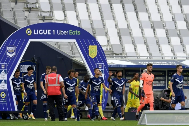 L'entrée sur le terrain des joueurs de Bordeaux et de Nantes pour le match de Ligue 1 au stade Matmut-Atlantique de Bordeaux, le 21 août 2020