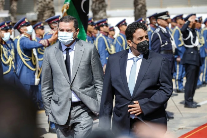 Mohamed al-Manfi (d) et Abdelhamid Dbeibah à Tripoli le 16 mars 2021