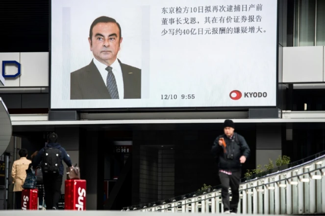 Le portrait de Carlos Ghosn diffusé par la télévision japonaise sur un écran géant à Tokyo, le 10 décembre 2018