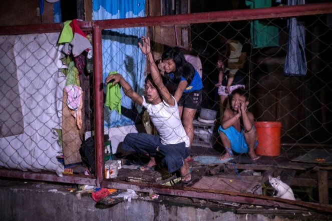 Douleur des proches d'un trafiquant de drogue présumé tué aux Philippines, à Manille, le 4 janvier 2017