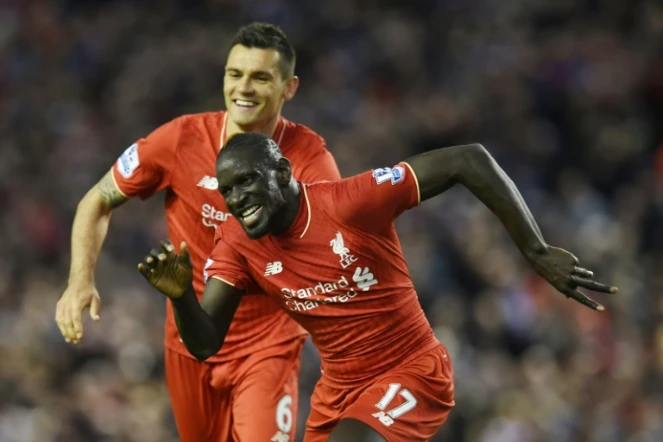 Le défenseur de Liverpool Mamadou Sakho (d) en liesse après avoir inscrit un but face à Everton, le 20 avril à Anfield