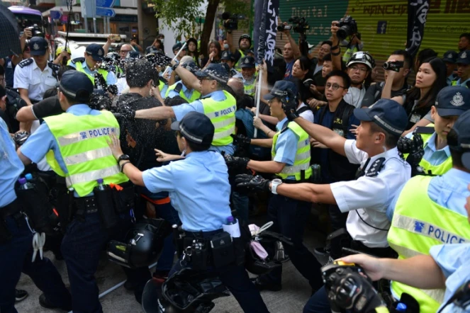 Isolated scuffles have already broken out, with police using pepper spray