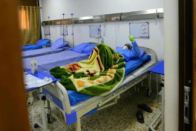 Un malade du Covid-19 dans un hôpital de Najaf, au sud de Bagdad, le 25 mars 2020