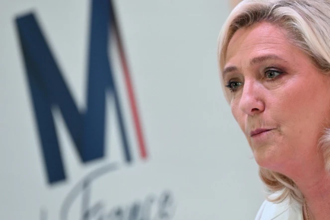 Marine Le Pen, candidate du Rassemblement national à la présidentielle, lors d'une conférence de presse à Paris le 13 avril 2022