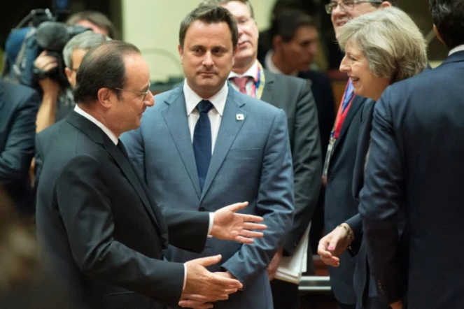 Le président Hollande et la Première ministre britannique Theresa May pendant le sommet européen à Bruxelles le 20 octobre 2016
