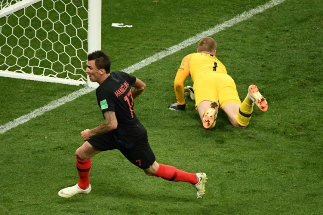 Le Croate Mario Mandzukic vient de marquer le but de la victoire contre l'Angleterre en prolongation de la demi-finale du Mondial, le 11 juillet 2018 à Moscou
