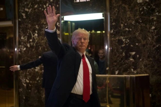 Donald Trump arrive à la Tour Trump avant une série de rendez-vous, le 13 janvier 2017, à New York.