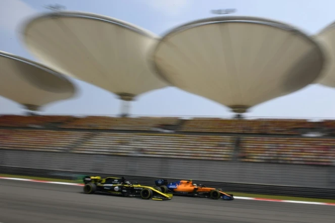 Le GP de Chine à Shanghai, avec ici la Renault de Daniel Ricciardo et la McLaren de Lando Norris, roues dans roues, le 12 avril 2019, vient d'être reporté pour cette saison