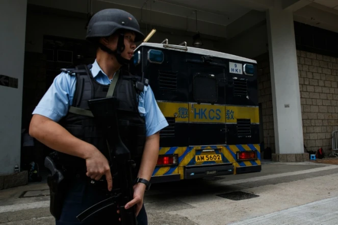 Le fourgon transportant le banquier britannique Rurik Jutting accusé de double meurtre, à son arrivée le 24 octobre 2016 au tribunal à Hong Kong