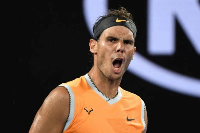 L'Espagnol Rafael Nadal exulte après sa victoire face à l'Australien Alex De Minaur, le 18 janvier 2019 à Melbourne 