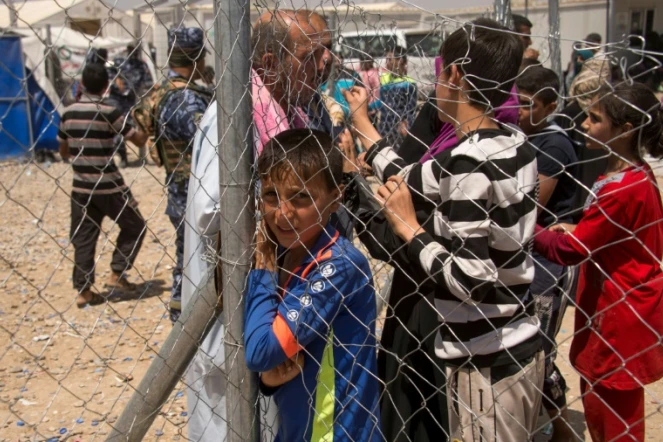 Des Irakiens ayant fui Mossoul dans le camp de réfugiés d'Hammam al-ALil, en Irak, le 14 mai 2017