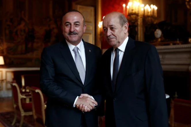 Le ministre français des Affaires étrangères, Jean-Yves Le Drian, et son homologue turc Mevlut Cavusoglu, au Quai d'Orsay, le 30 septembre 2018