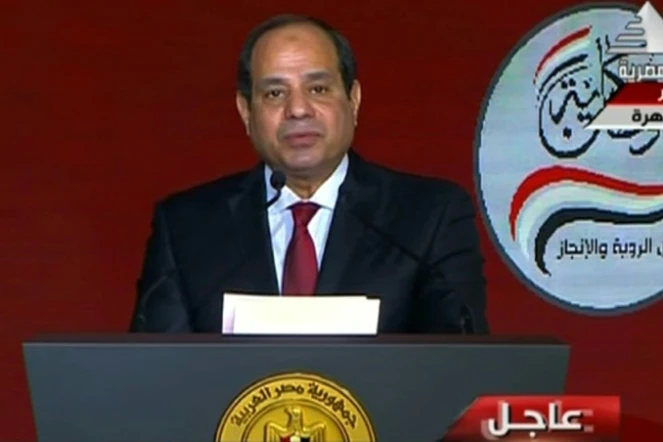 Capture d'écran de la télévision d'Etat Al-Masriya montrant le président Abdel Fattah al-Sissi annonçant sa candidature pour un nouveau mandat lors d'une conférence au Caire, le 19 janvier 2018 