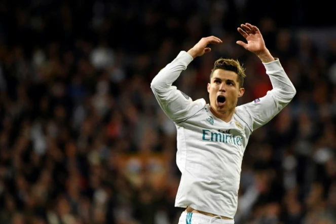 L'attaquant vedette du Real Madrid Cristiano Ronaldo exulte après avoir inscrit un but face à la Juventus en quarts de finale retour de C1, le 3 avril 2018 à Turin