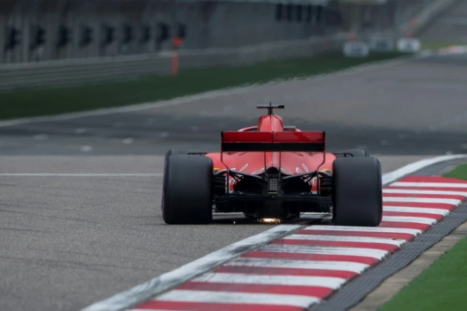 L'Allemand Sebastian Vettel au volant de sa Ferrari, lors des qualifications pour le GP de Chine, sur le circuit de Shanghai, le 14 avril 2018 