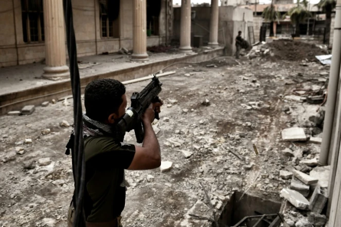 Un membre des forces irakiennes le 11 mars 2017 à Mossoul ouest