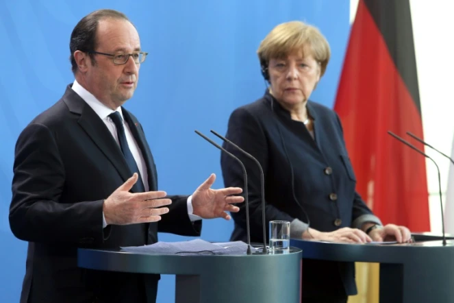 François Hollande et  Angela Merkel lors d'un point de presse le 27 janvier 2017 à Berlin