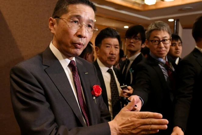 Hiroto Saikawa (g) patron de Nissan pendant un entretien avec l'Agence France-Presse en marge d'un événement de la fédération patronale Keidanren à Tokyo le 7 janvier 2019.