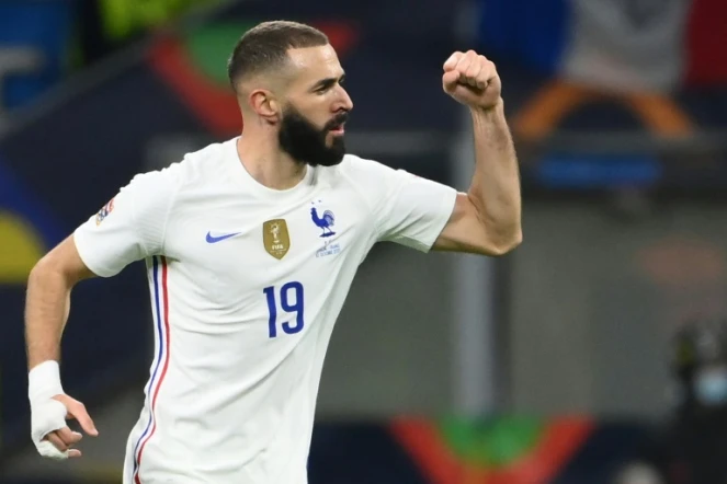 L'attaquant français Karim Benzema après avoir marqué un but lors de la finale de la Ligue des Nations de football entre l'Espagne et la France au stade San Siro à Milan, le 10 octobre 2021.