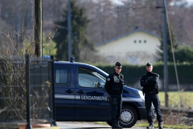 Des gendarmes à Domessin, en Savoie, lors du transport de Nordahl Lelandais, le 14 février 2018
