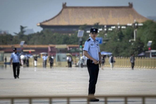 Des policiers sur la place Tiananmen le 3 juin 2019, à la veille du 30e anniversaire de la répression sanglante des manifestations